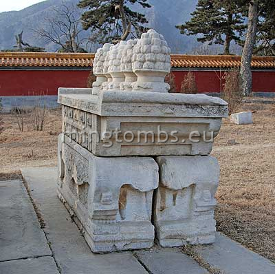 Stone altar with five pineapples